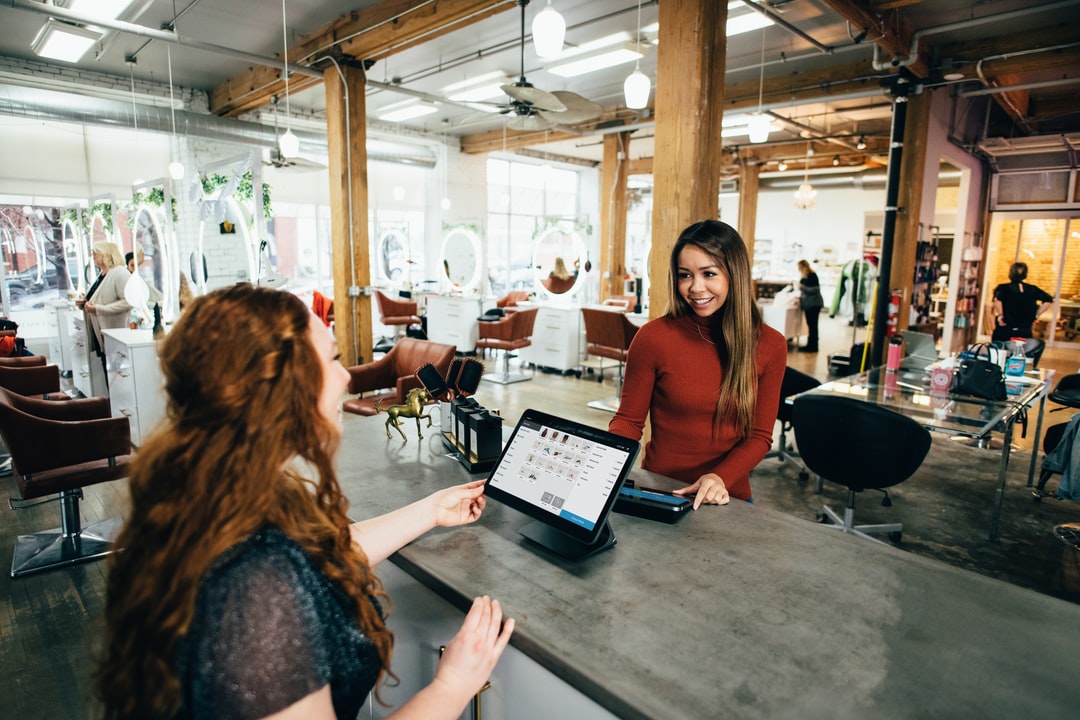 image of 2 women doing online marketing for products